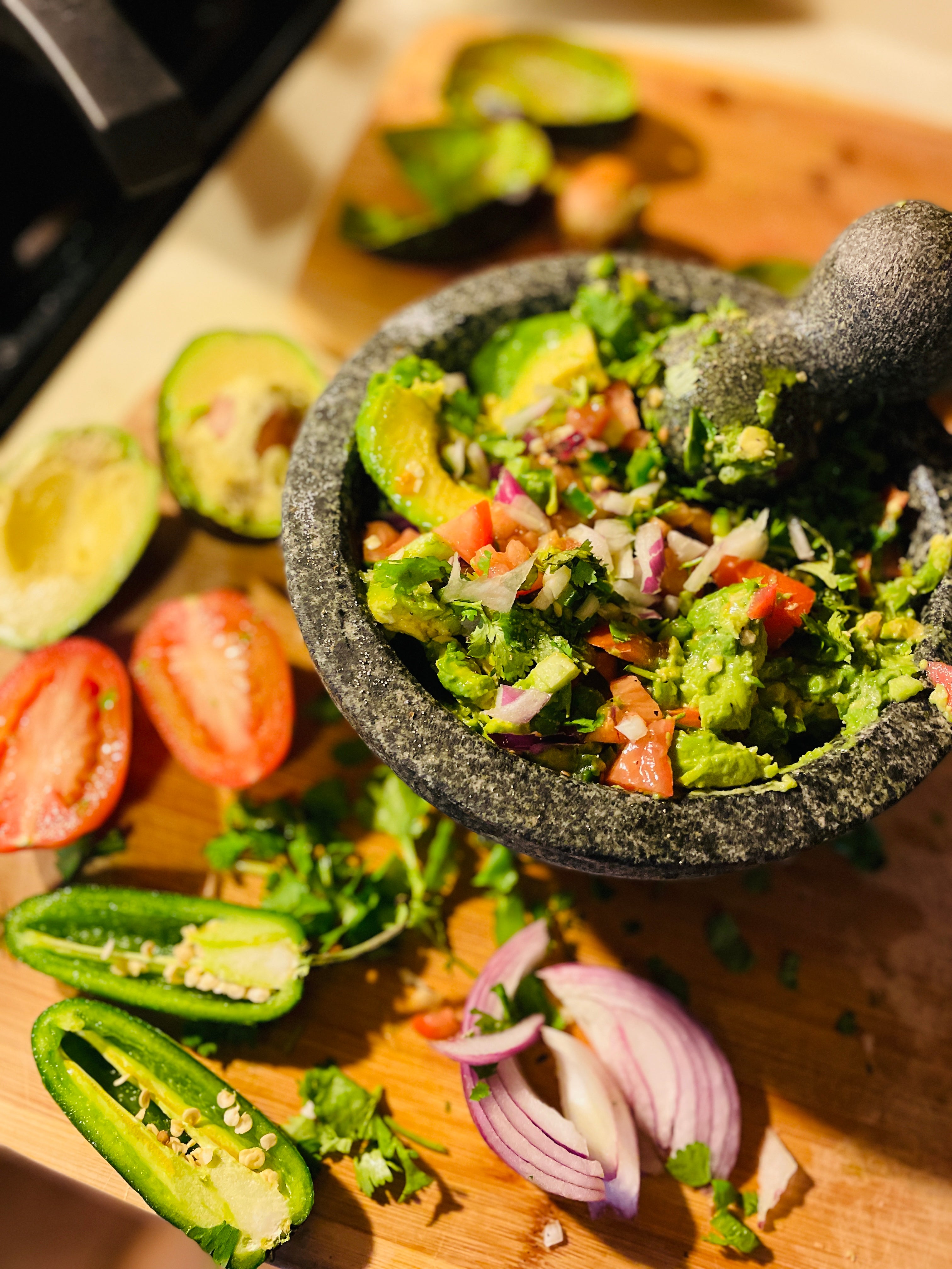 mexican spicy guacamole presented in a bowl