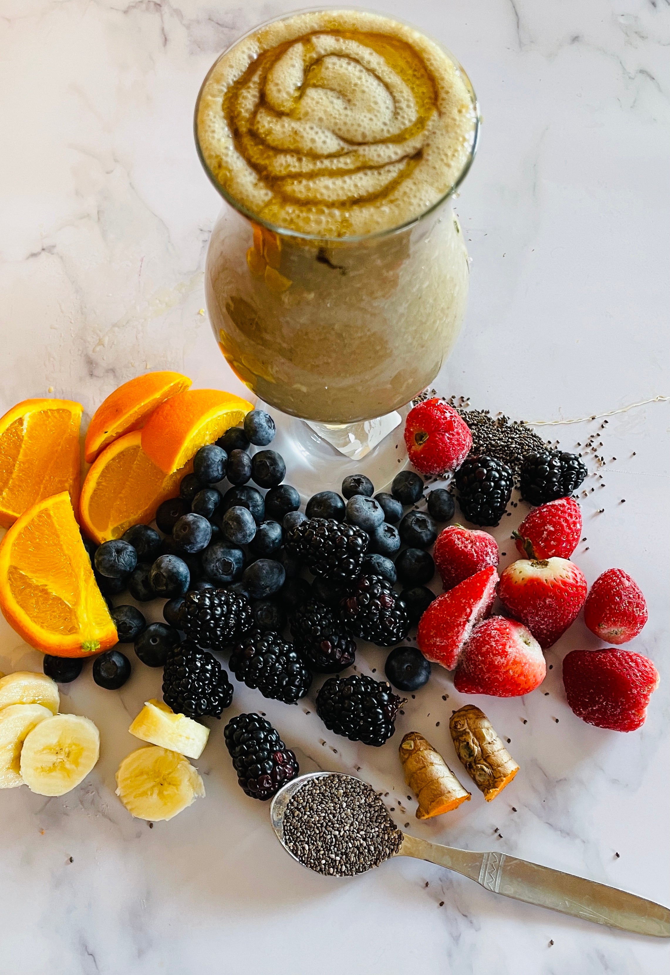 Healthy smoothie with fresh berries around